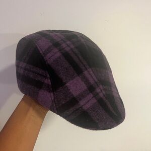Purple and black plaid newsboy cap.